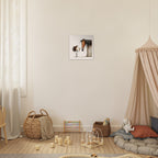 A framed wall art print depicting a horse and a child hanging on a cream wall in a styled children's playroom with wooden toys, woven baskets, and a beige canopy bed.