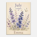 A personalized floral art print featuring purple larkspur flowers on a cream background, with the text 'July', 'Larkspur', and 'Emma' printed on the design.