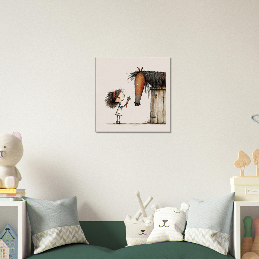 A square wall art print featuring a whimsical illustration of a small girl with dark hair and a brown horse at a stable, displayed on a light beige wall above a green sofa with decorative pillows in a styled children's room.
